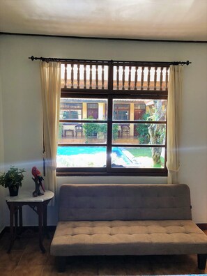 Quarto família | Área de estar | TV de tela plana