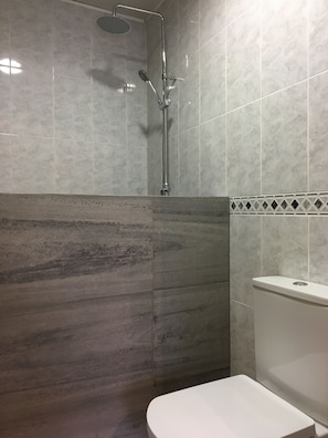 Apartment, 1 Bedroom, Courtyard View | Bathroom | Deep soaking tub, hair dryer, towels