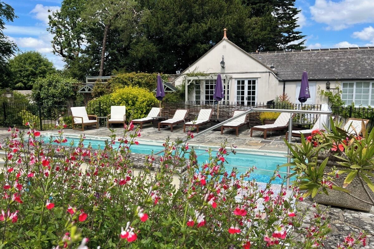 Outdoor pool, pool umbrellas, pool loungers