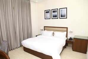 Desk, free WiFi, bed sheets