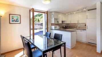 Apartment | Private kitchen | Fridge, microwave, oven, stovetop