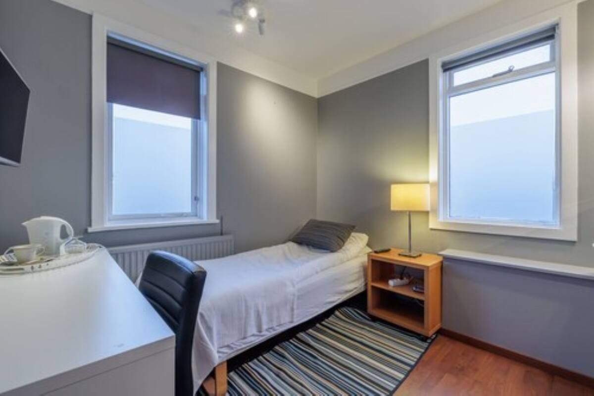 Basic Single Room, Shared Bathroom | Desk, laptop workspace, blackout drapes, iron/ironing board (on request)