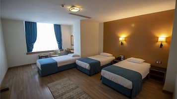 Standard Triple Room | 1 bedroom, minibar, in-room safe, desk