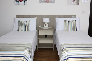 Standaard kamer, 1 twee- of 2 eenpersoonsbedden | Een gratis minibar, individueel gedecoreerd, individueel gemeubileerd