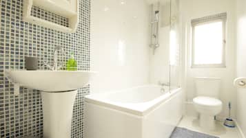 Combined shower/bathtub, soap, shampoo