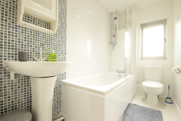 Combined shower/tub, soap, shampoo