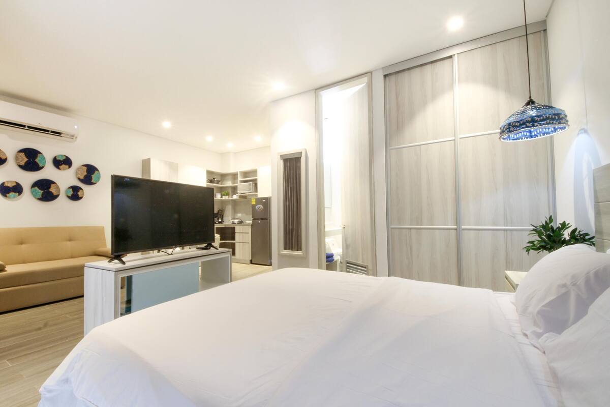 Premium bedding, down duvets, in-room safe, desk