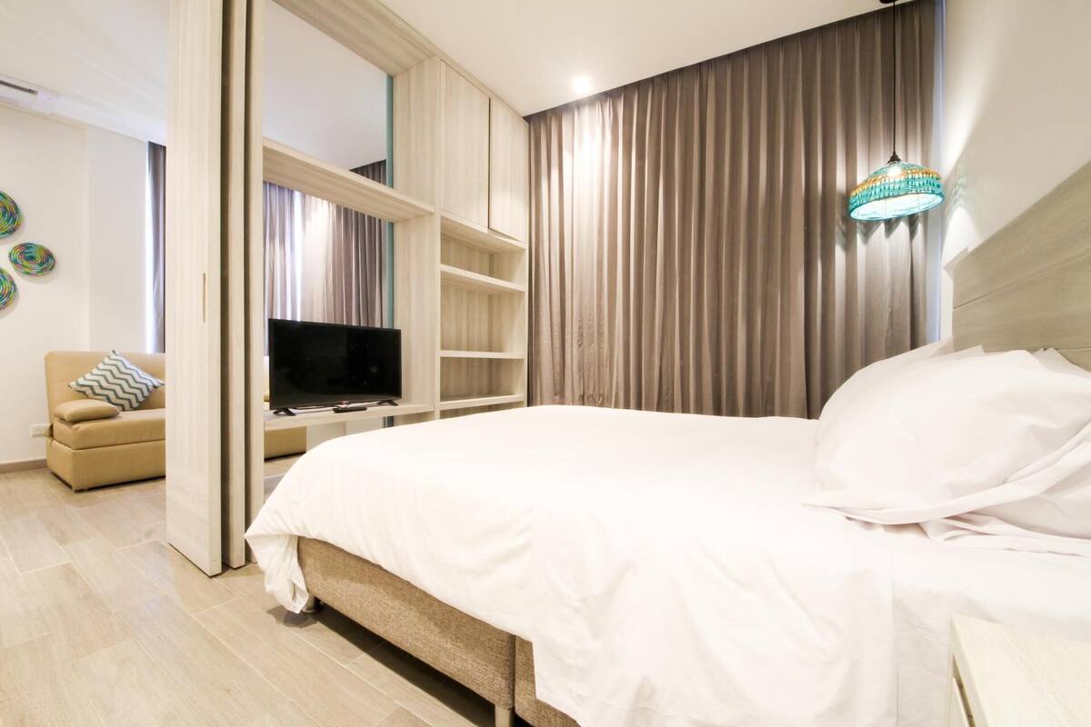Premium bedding, down duvets, in-room safe, desk