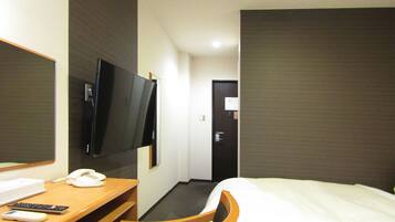 Deluxe Single Room, Non Smoking | Down comforters, desk, laptop workspace, blackout drapes