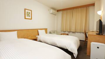 Down comforters, desk, laptop workspace, blackout drapes