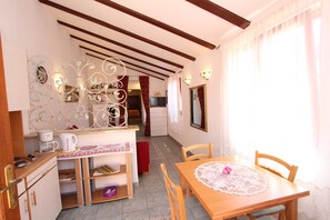 Apartment, 1 Bedroom, Terrace | Living area | Flat-screen TV