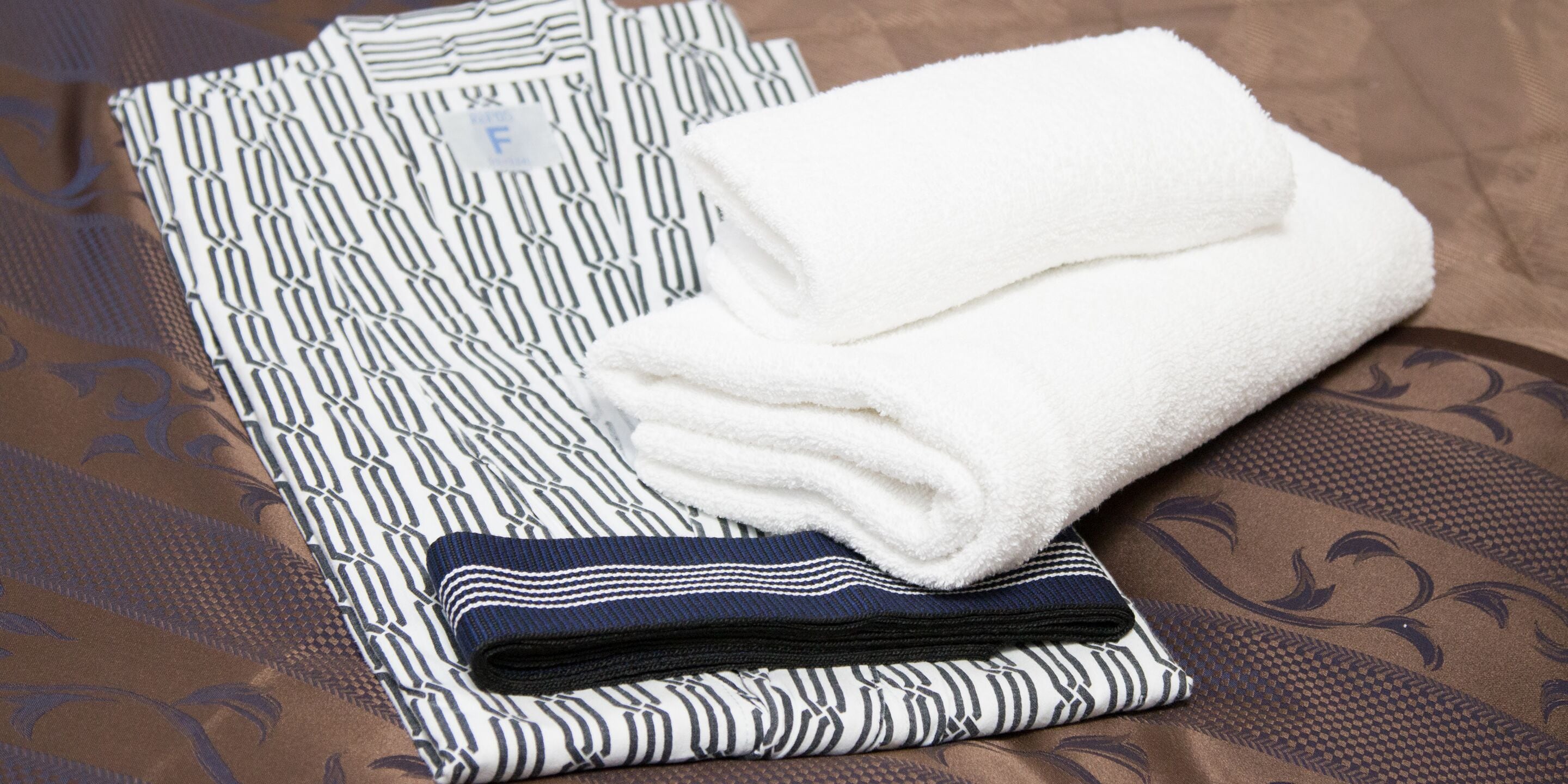 free toiletries, slippers, electronic bidet, towels