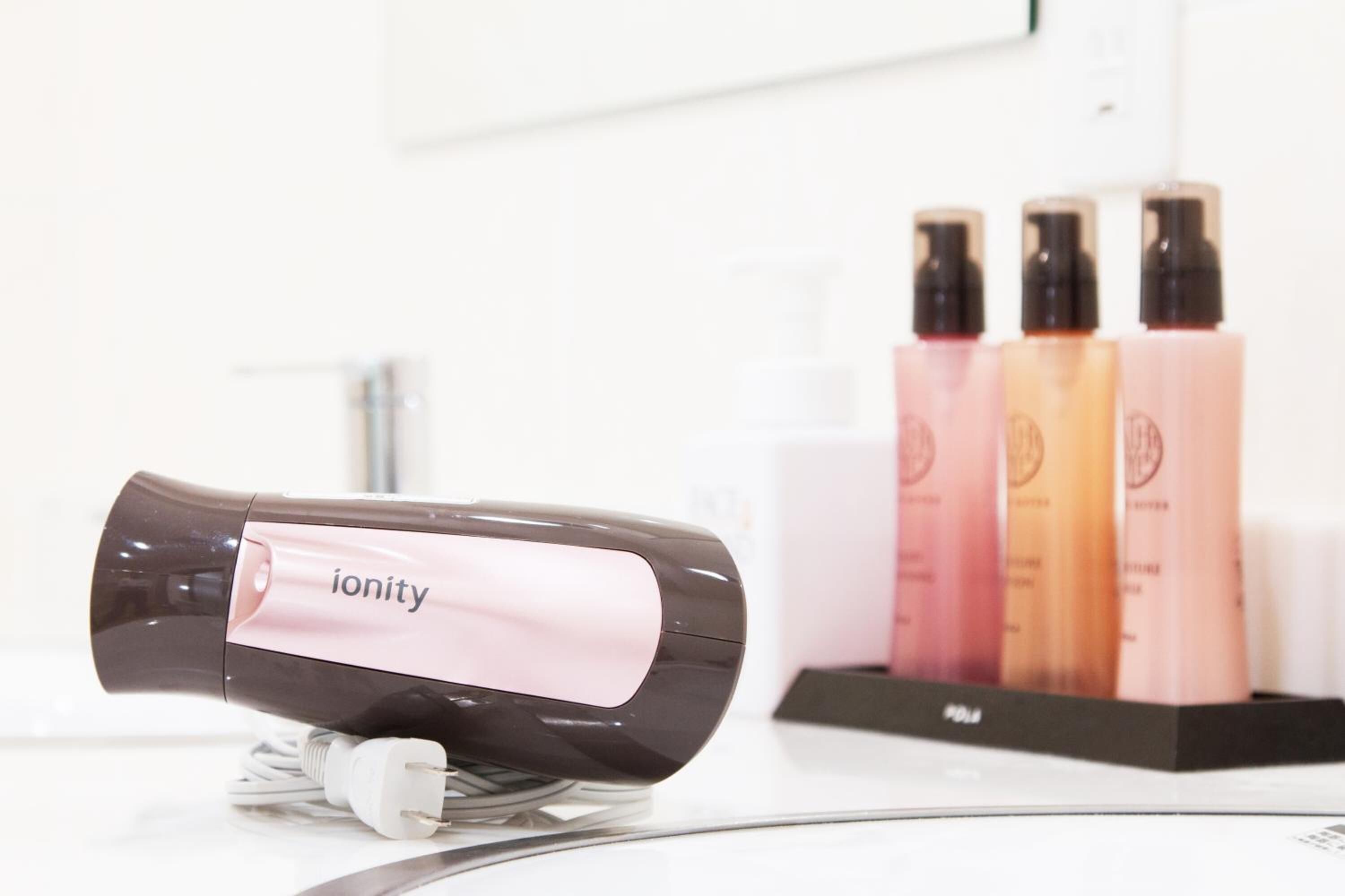 free toiletries, slippers, electronic bidet, towels