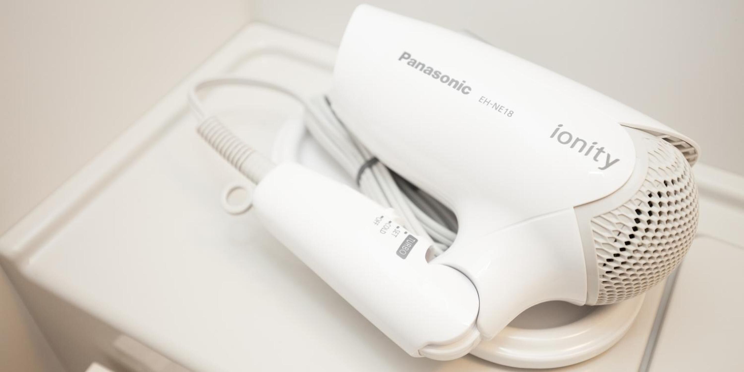 free toiletries, slippers, electronic bidet, towels