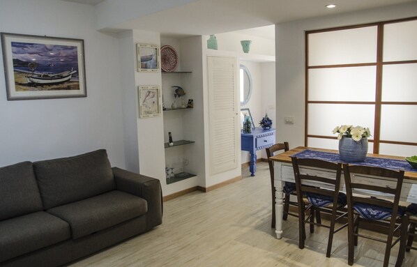 Apartment, 1 Bedroom | Living area | Flat-screen TV