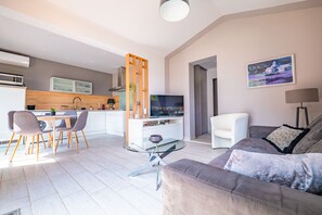 TV, DVD player, table football, books