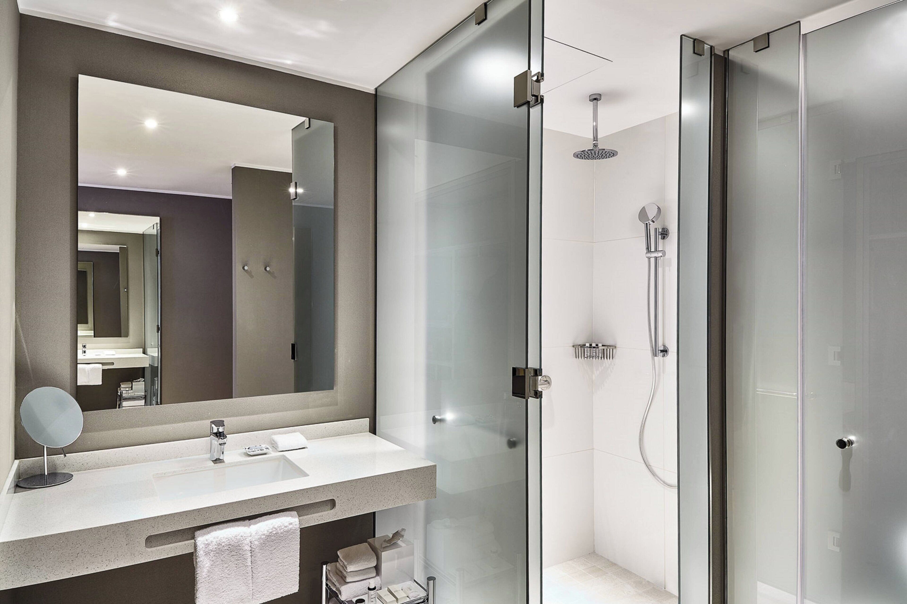 junior suite, 1 king bed, non smoking, oceanfront (view) | bathroom | shower, hydromassage showerhead, designer toiletries, hair dryer