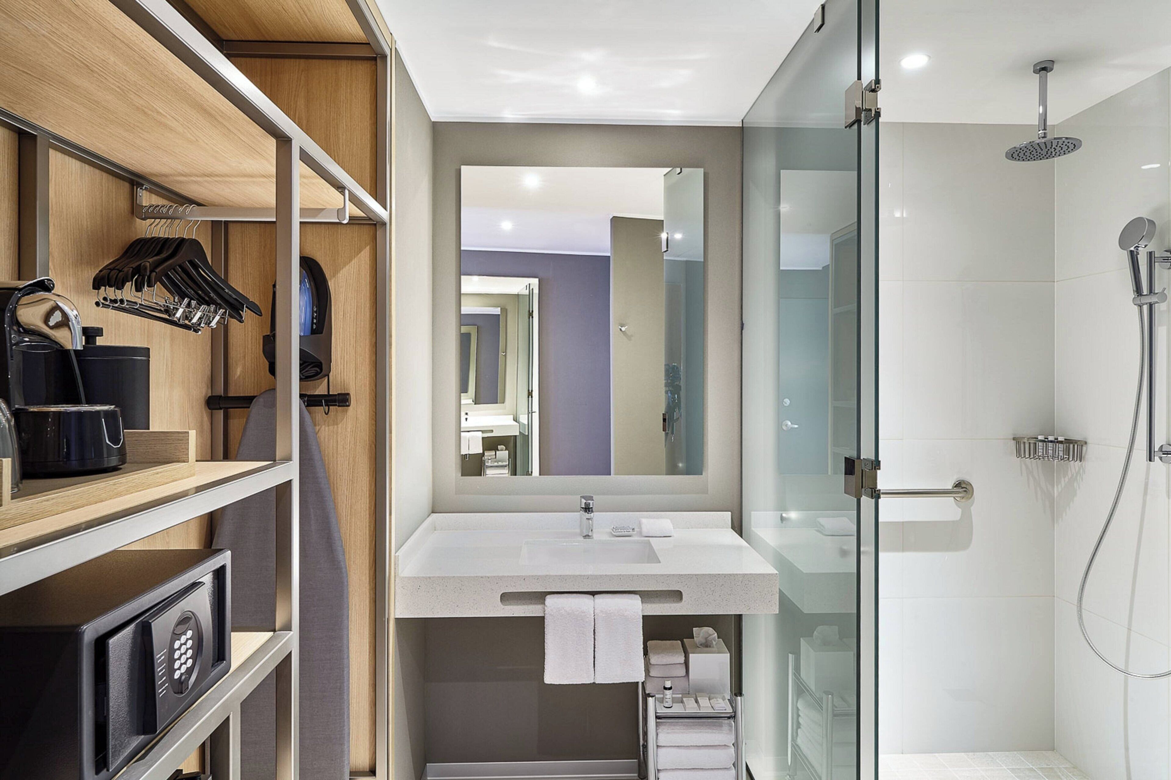 shower, hydromassage showerhead, designer toiletries, hair dryer