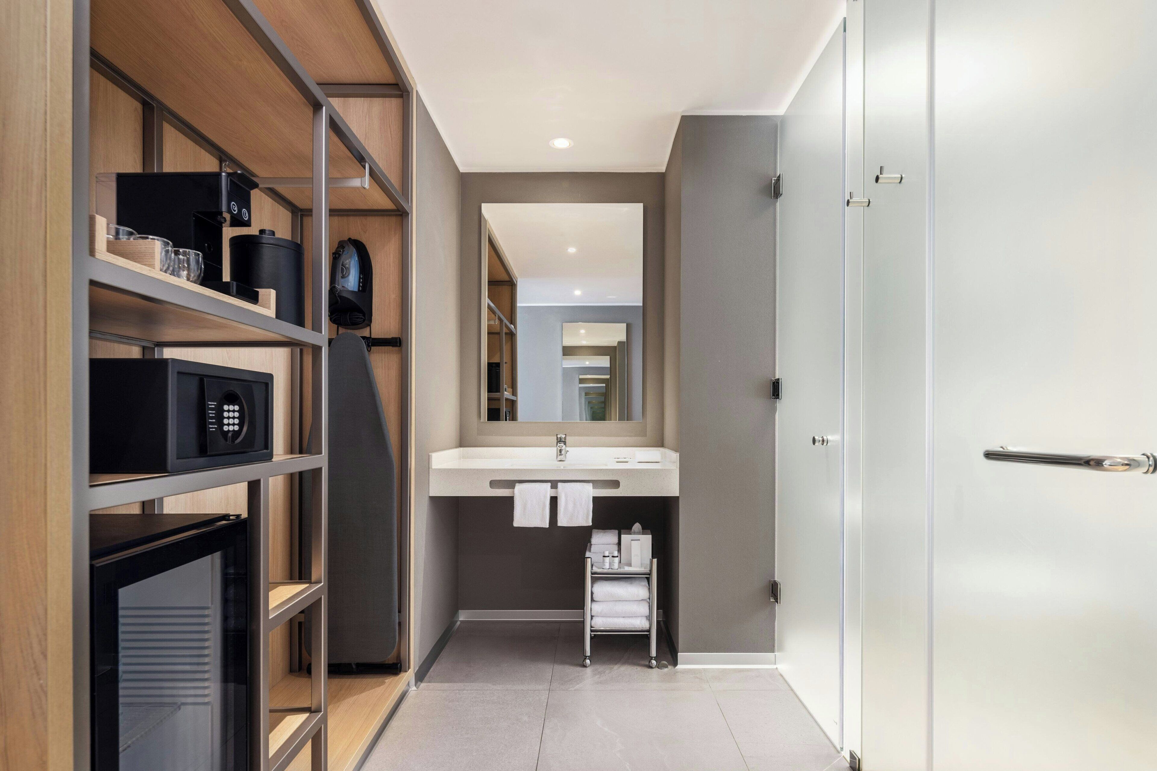 shower, hydromassage showerhead, designer toiletries, hair dryer