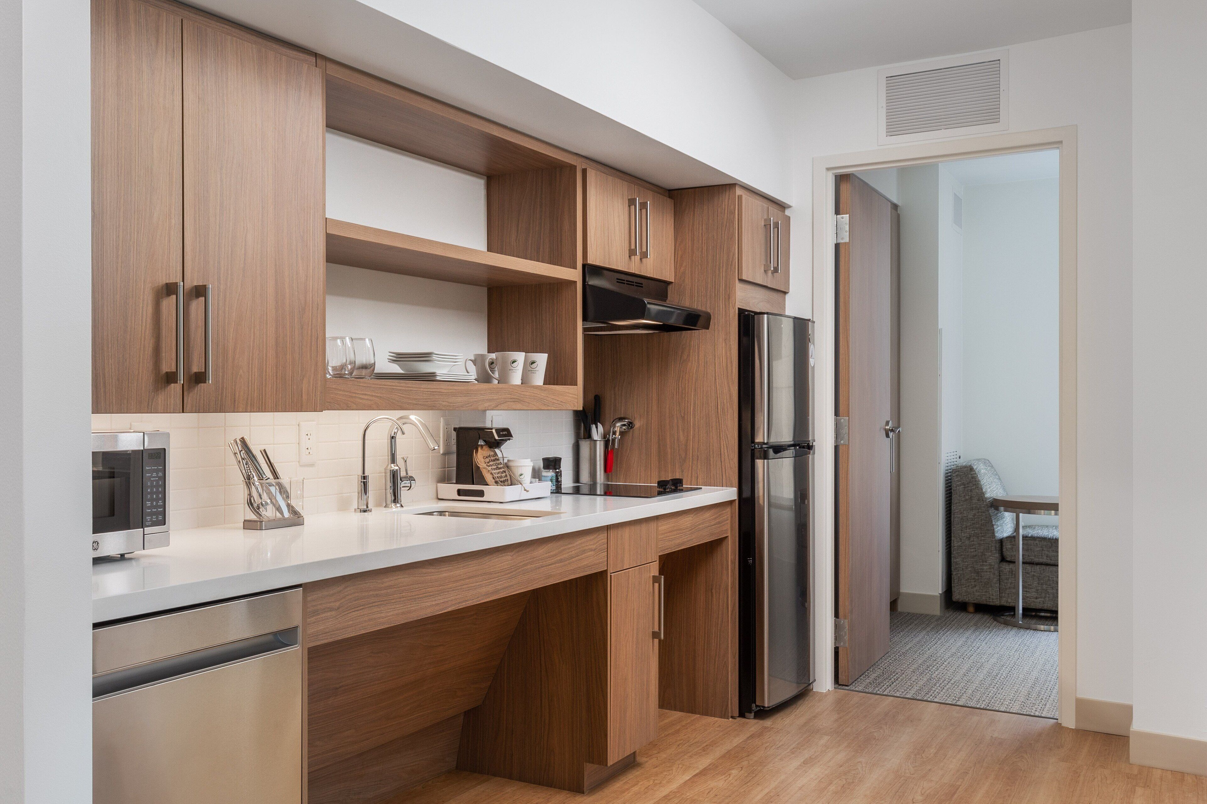 suite, 1 bedroom, non smoking | private kitchen | microwave, coffee/tea maker, toaster, cookware/dishes/utensils