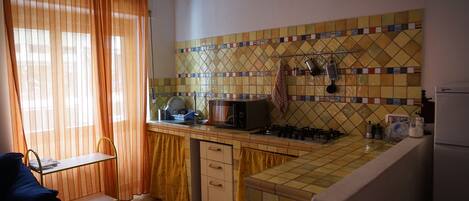 Apartment, 1 Bedroom | Private kitchen | Fridge, microwave, oven, stovetop