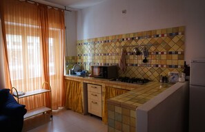 Apartment, 1 Schlafzimmer | Eigene Küche | Kühlschrank, Mikrowelle, Ofen, Herdplatte