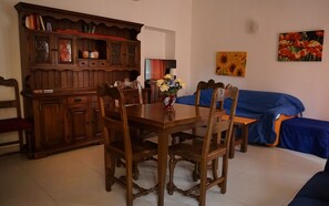 Apartment, 1 Bedroom | Living area | Flat-screen TV