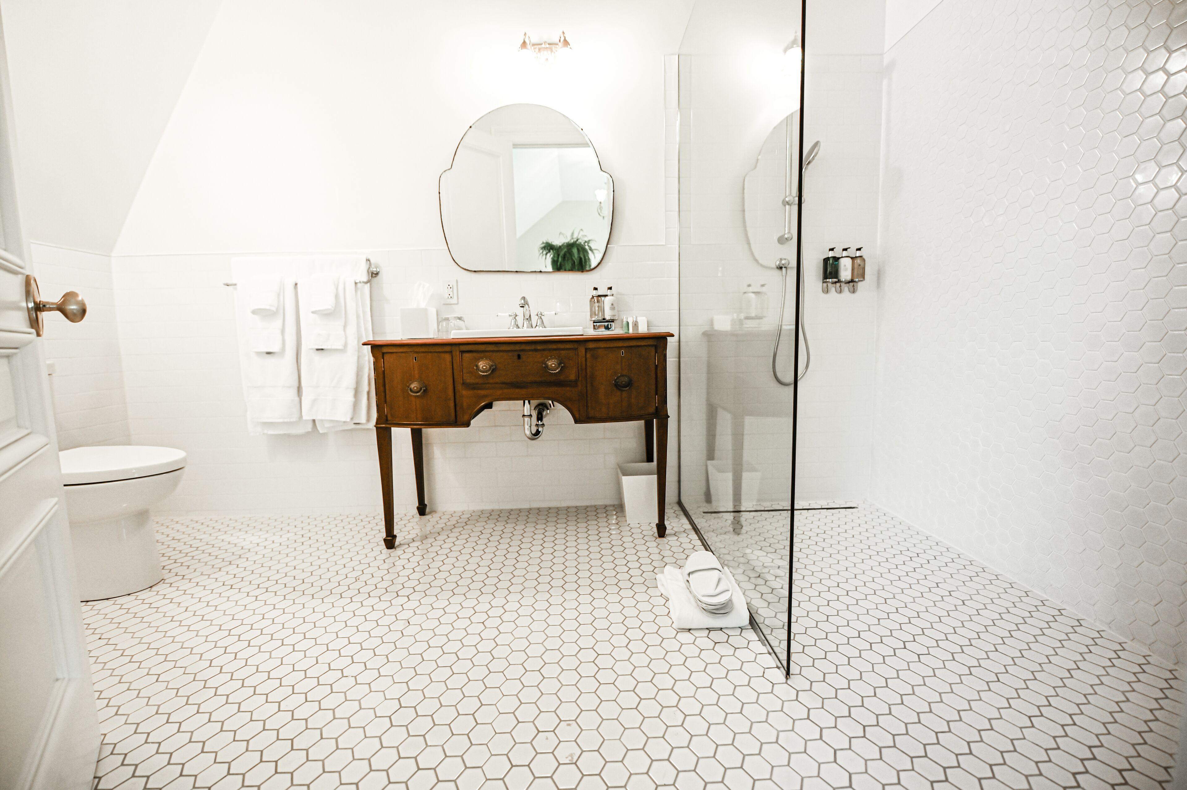 signature studio suite, 1 king bed, annex building | bathroom | shower, designer toiletries, hair dryer, bathrobes