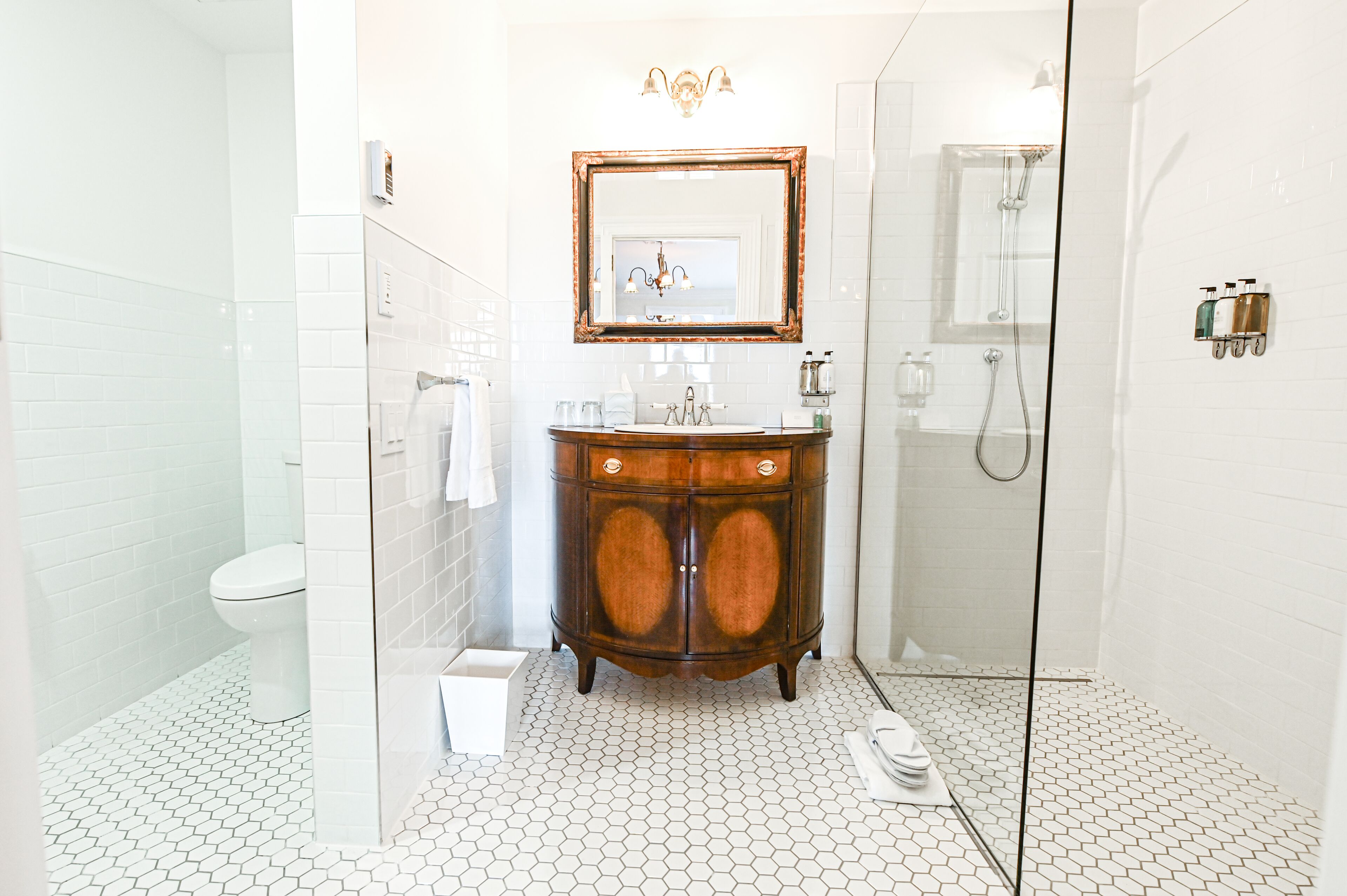 shower, designer toiletries, hair dryer, bathrobes