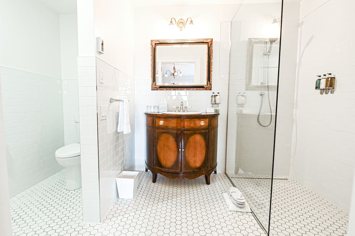 shower, designer toiletries, hair dryer, bathrobes