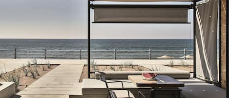 On the beach, sun-loungers, beach umbrellas, beach towels