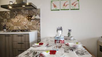 Apartamento, 1 quarto | Opções para refeição no quarto