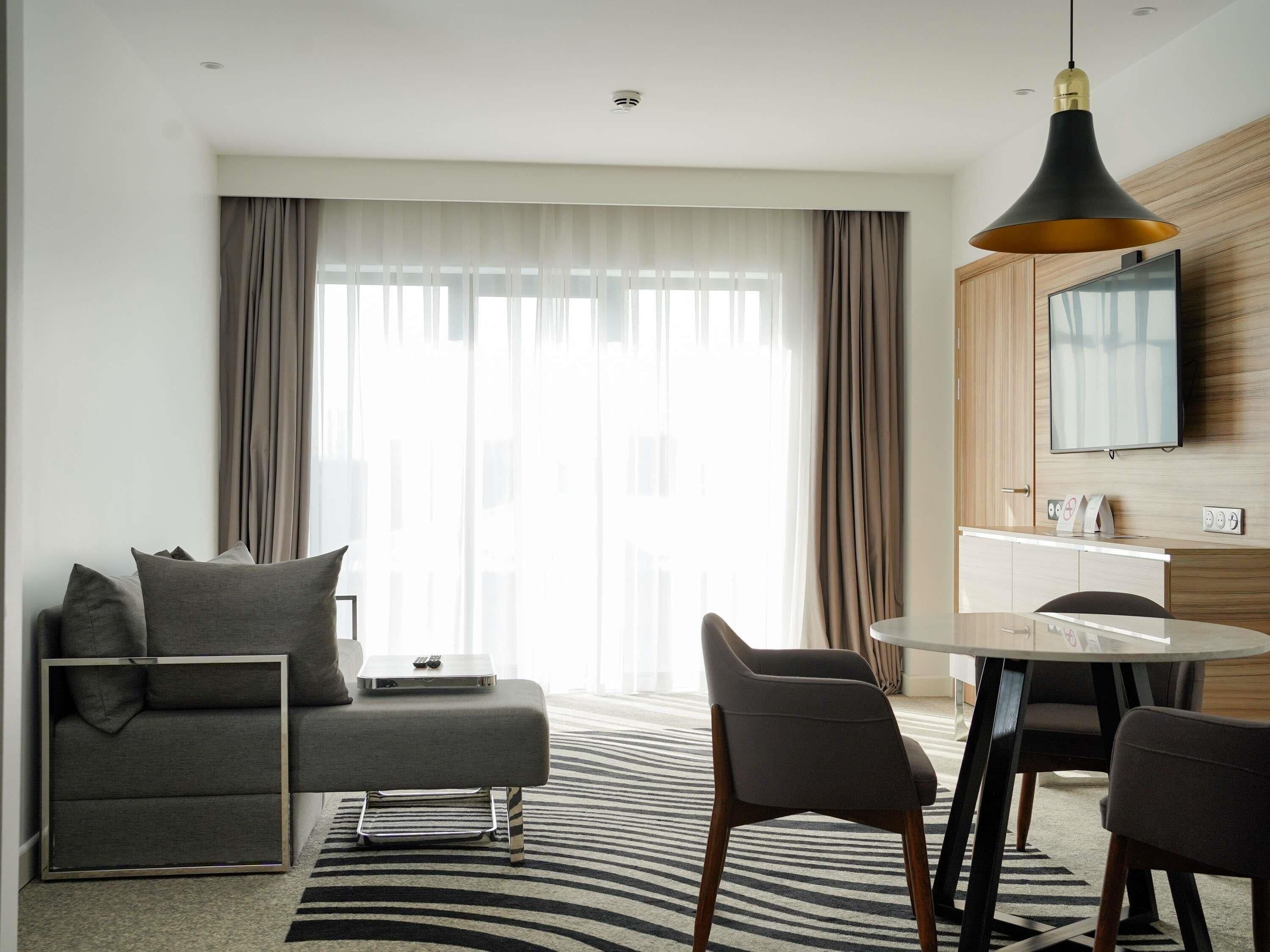 Căn hộ, 1 giường đôi và sofa giường | Minibar, bàn, khu vực làm việc phù hợp cho laptop, phòng cách âm 