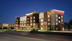 A multi-story hotel with a modern design, featuring a prominent sign for 'TownePlace Suites by Marriott'. - TownePlace Suites by Marriott Cedar Rapids Marion (Marion)