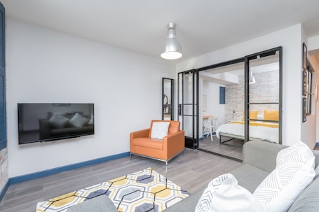 Studio, 1 Double Bed with Sofa bed | Living area | Flat-screen TV