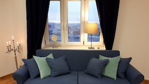 Comfort Apartment, 1 Queen Bed with Sofa bed, Valley View | Living room | TV - Sienkiewicza10 (Lomza)