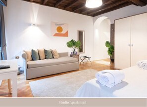Design Studio, City View | Living area | Flat-screen TV - Villa Luciano - Luxury Design Apartments (Rome)