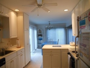 View of kitchen and dining area.