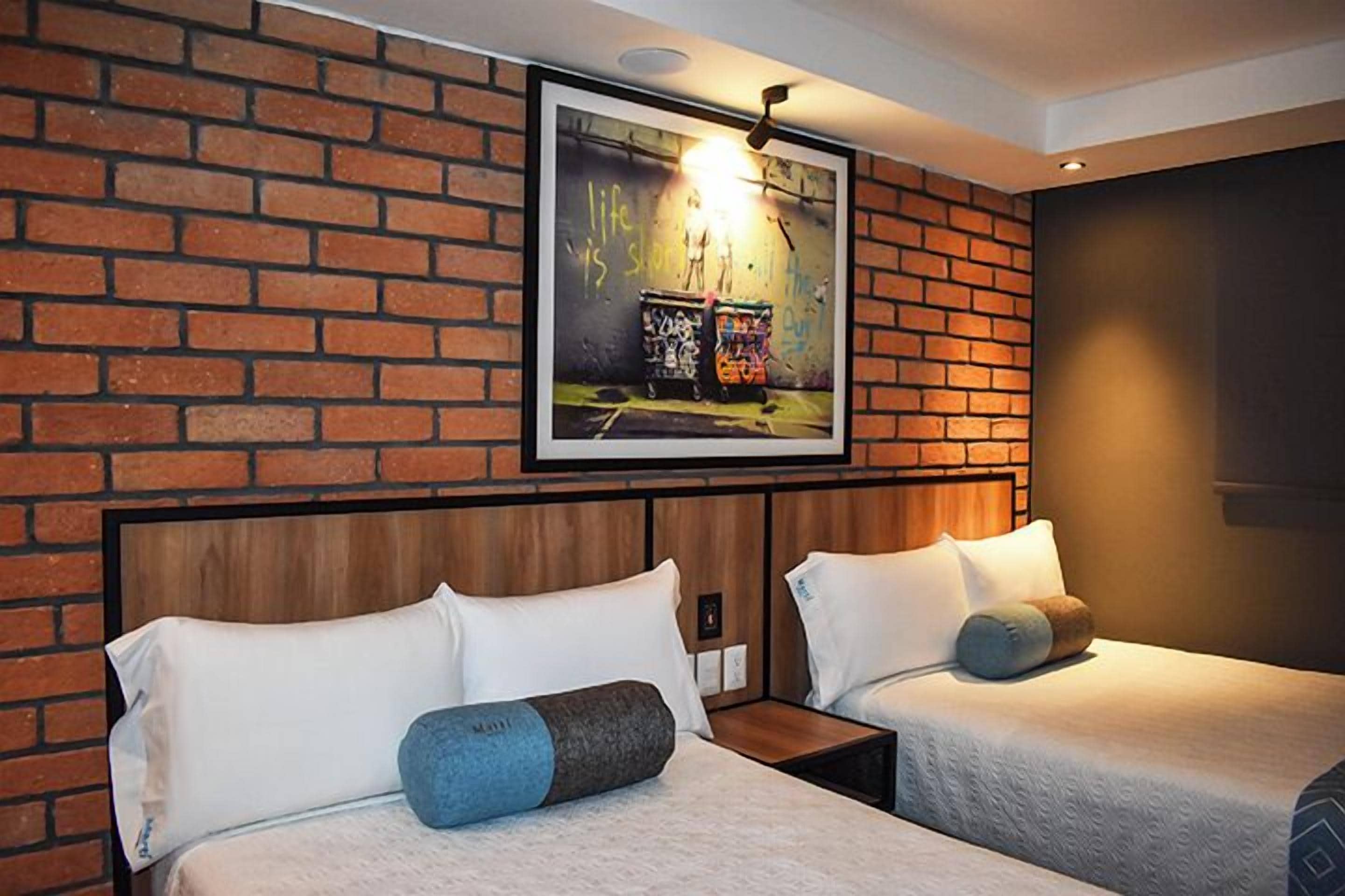 deluxe room, 2 double beds | in-room safe, desk, iron/ironing board, free wifi