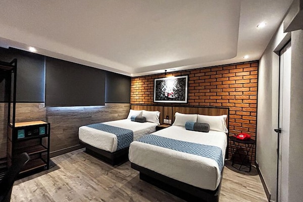 Deluxe Room, 2 Double Beds | In-room safe, desk, iron/ironing board, free WiFi