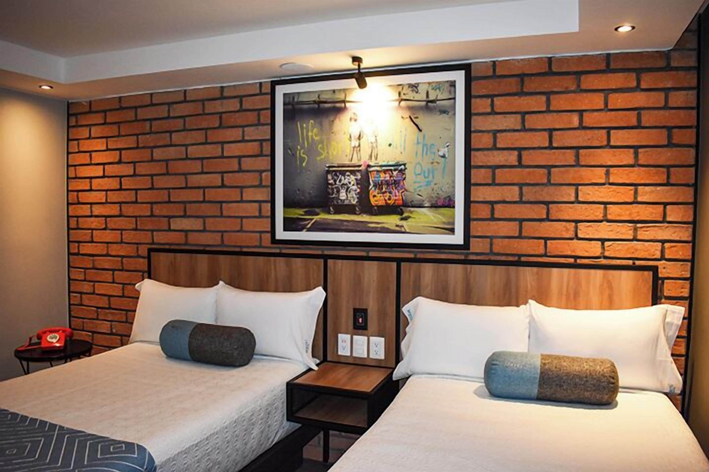 deluxe room, 2 double beds | in-room safe, desk, iron/ironing board, free wifi