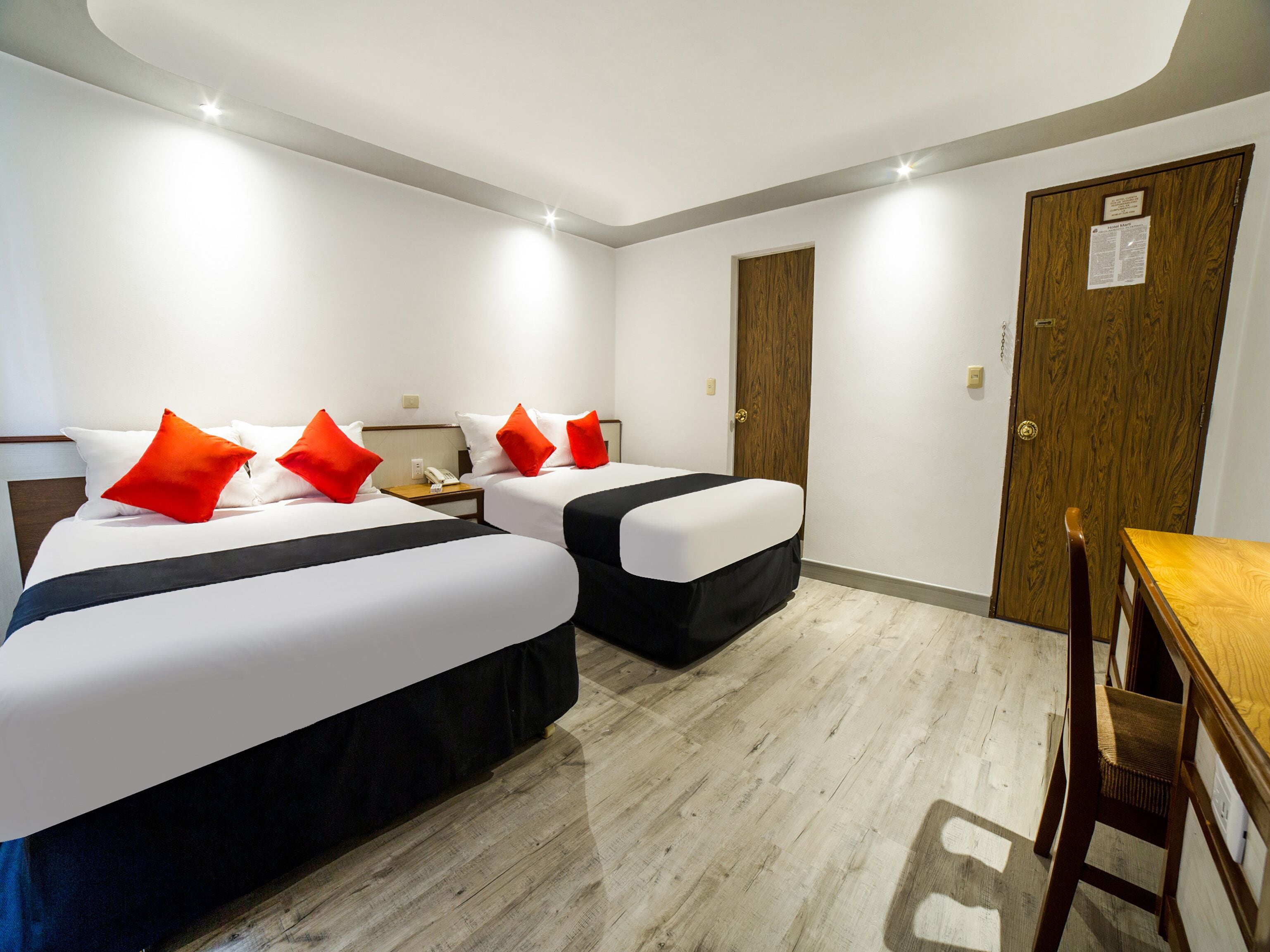 deluxe room, 2 double beds | in-room safe, desk, iron/ironing board, free wifi