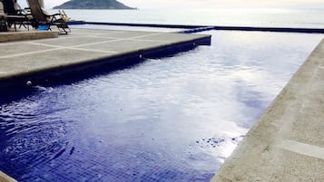 2 outdoor pools, pool umbrellas, pool loungers