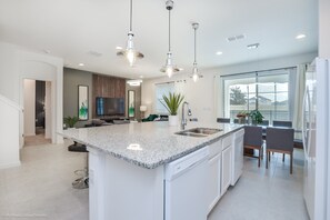 House, Multiple Beds | Private kitchen