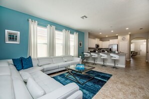 House, 6 Bedrooms | Living area | Flat-screen TV