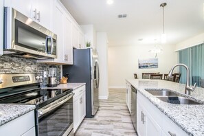 Townhome, 4 Bedrooms | Private kitchen
