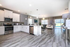 House, Multiple Beds | Private kitchen