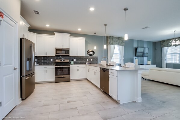 House, Multiple Beds | Private kitchen