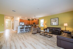 House, 4 Bedrooms | Living area | Flat-screen TV, foosball - Champions Gate Exec Villas- 9156sd (Davenport)