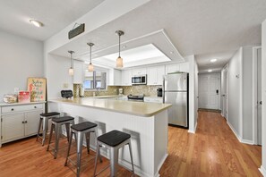 Fridge, microwave, oven, stovetop - The Flirty Flamingo 3br/2ba top floor condo in St. Augustine Beach (St Augustine Beach)